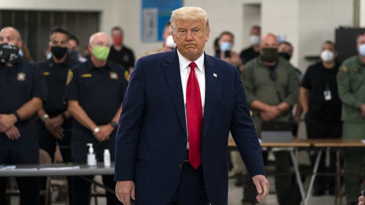 President Donald Trump tours an emergency operations center and meets with law enforcement officers at Mary D. Bradford High School, Tuesday, Sept. 1, 2020, in Kenosha, Wis. (AP Photo/Evan Vucci)