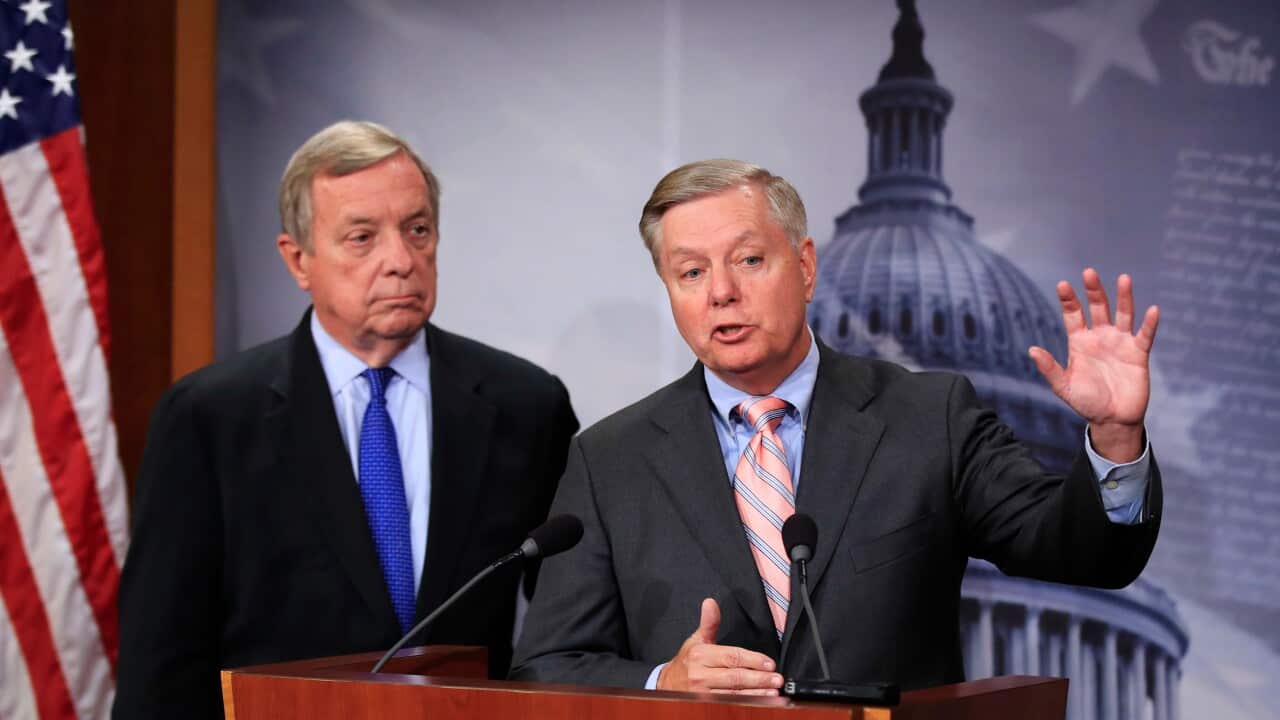 a news conference on Capitol Hill in Washington, to discuss their bipartisan Dream Act. A 12-year pathway to citizenship for young immigrants brought to the U.S.