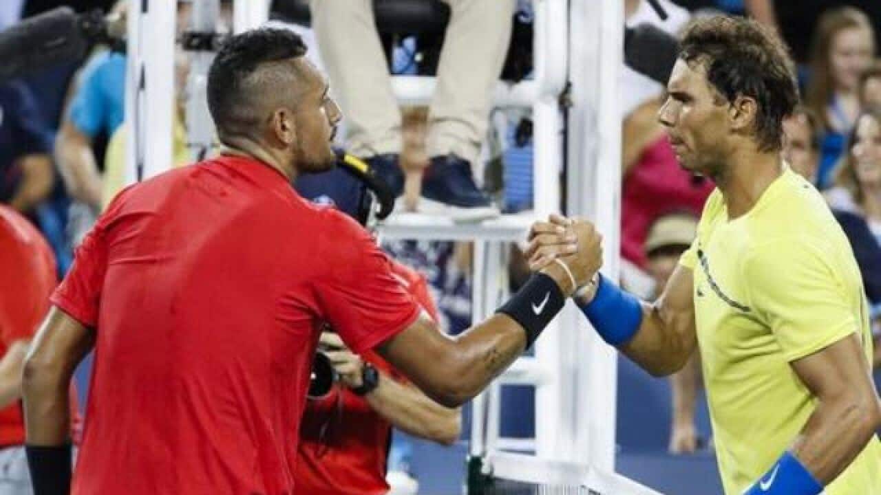 Nick Kyrgios, of Australia, shakes hands with Rafael Nadal, of Spain
