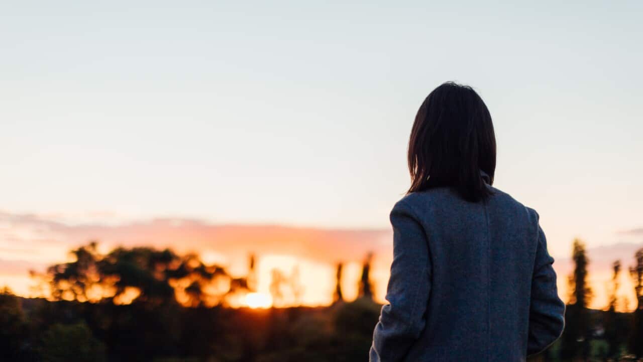 Lonely Woman Watching Sunset