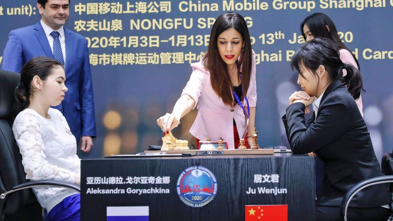 Shohreh Bayat officiating at a chess championship in Shanghai