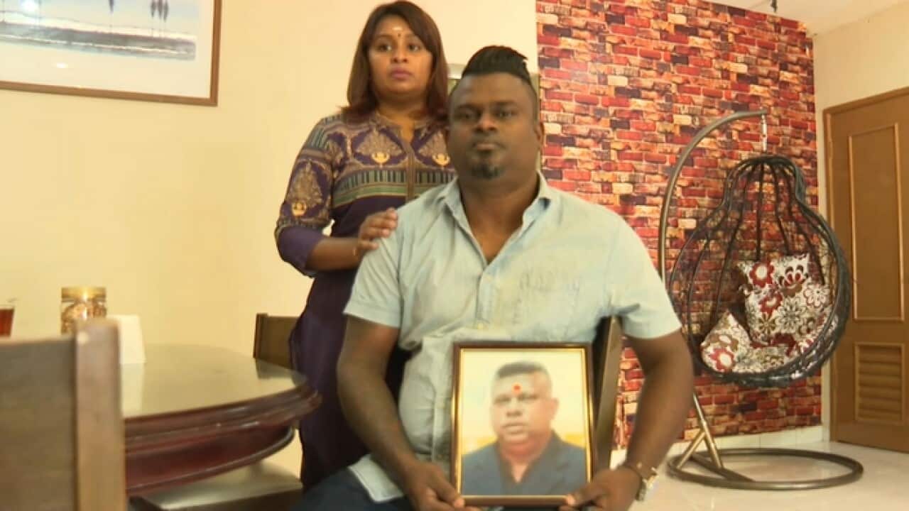 Balraj Suppiah, with a picture of his brother who died in police custody in 2017