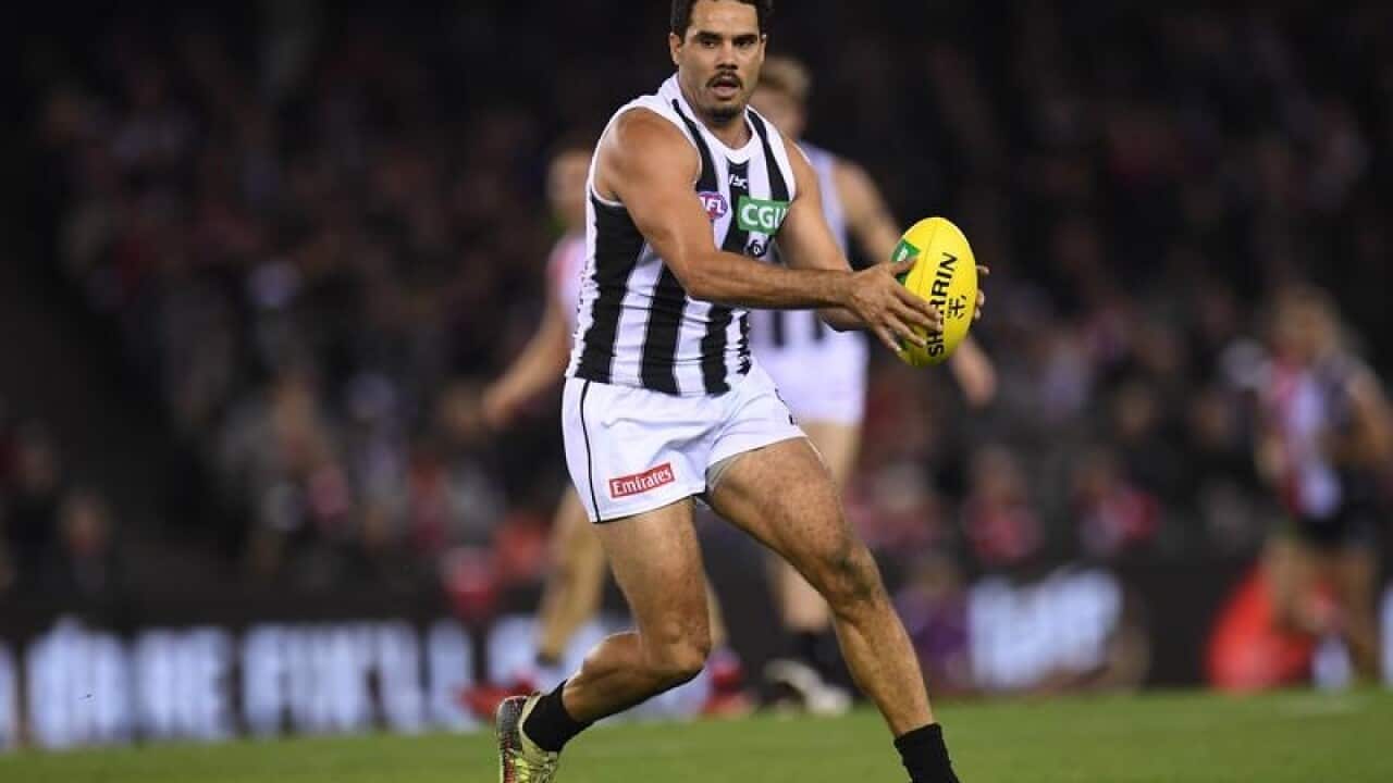 Daniel Wells of the Magpies is seen in action in round 9.
