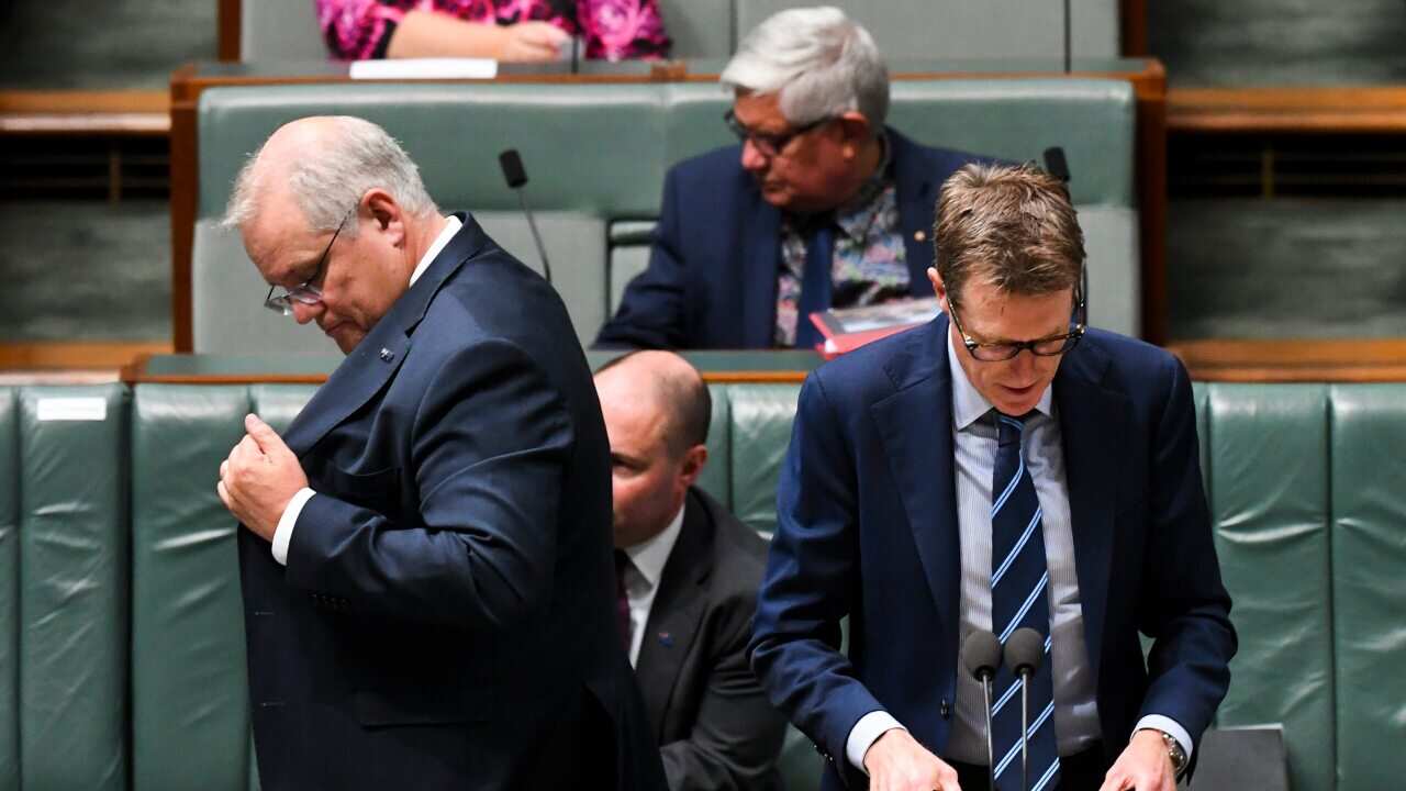 Australian Prime Minister Scott Morrison (left) and Australian Attorney-General Christian Porter in the House of Representatives at Parliament House.