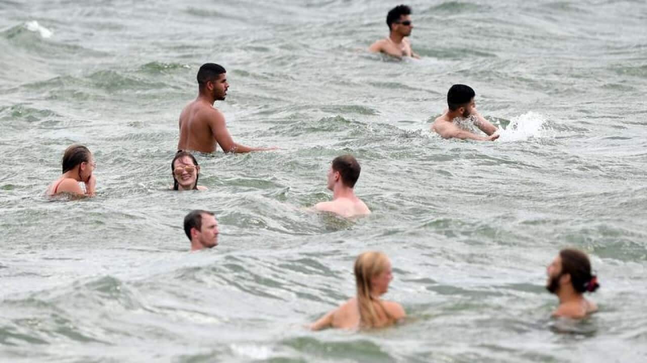 Swimmers at St Kilda beach in Melbourne.