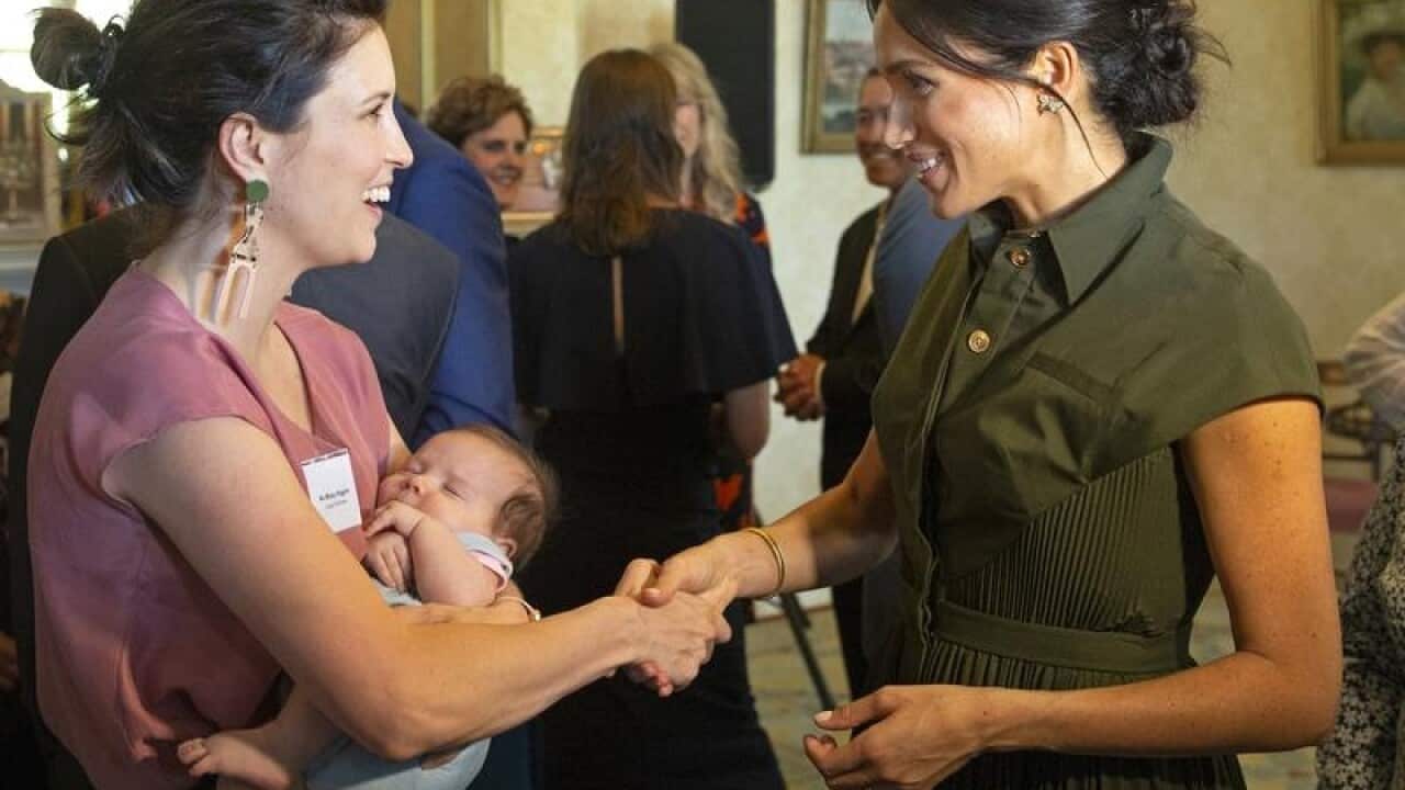Meghan Markle with singer Missy Higgins holding baby Luna.