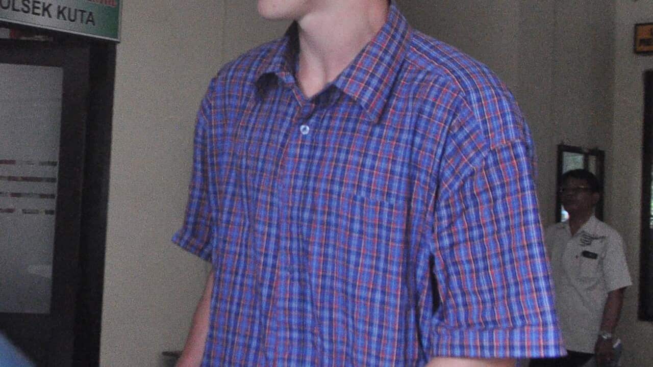 Australian teenager Jamie Murphy is escorted at Kuta police station, Bali, Indonesia, Tuesday, Nov. 22, 2016.