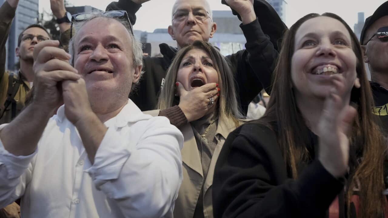 Relatives and friends of people killed and abducted by Hamas and taken into Gaza, react to the news of the hostages' release, as they gather in Tel Aviv, Israel on Sunday, Jan. 19, 2025