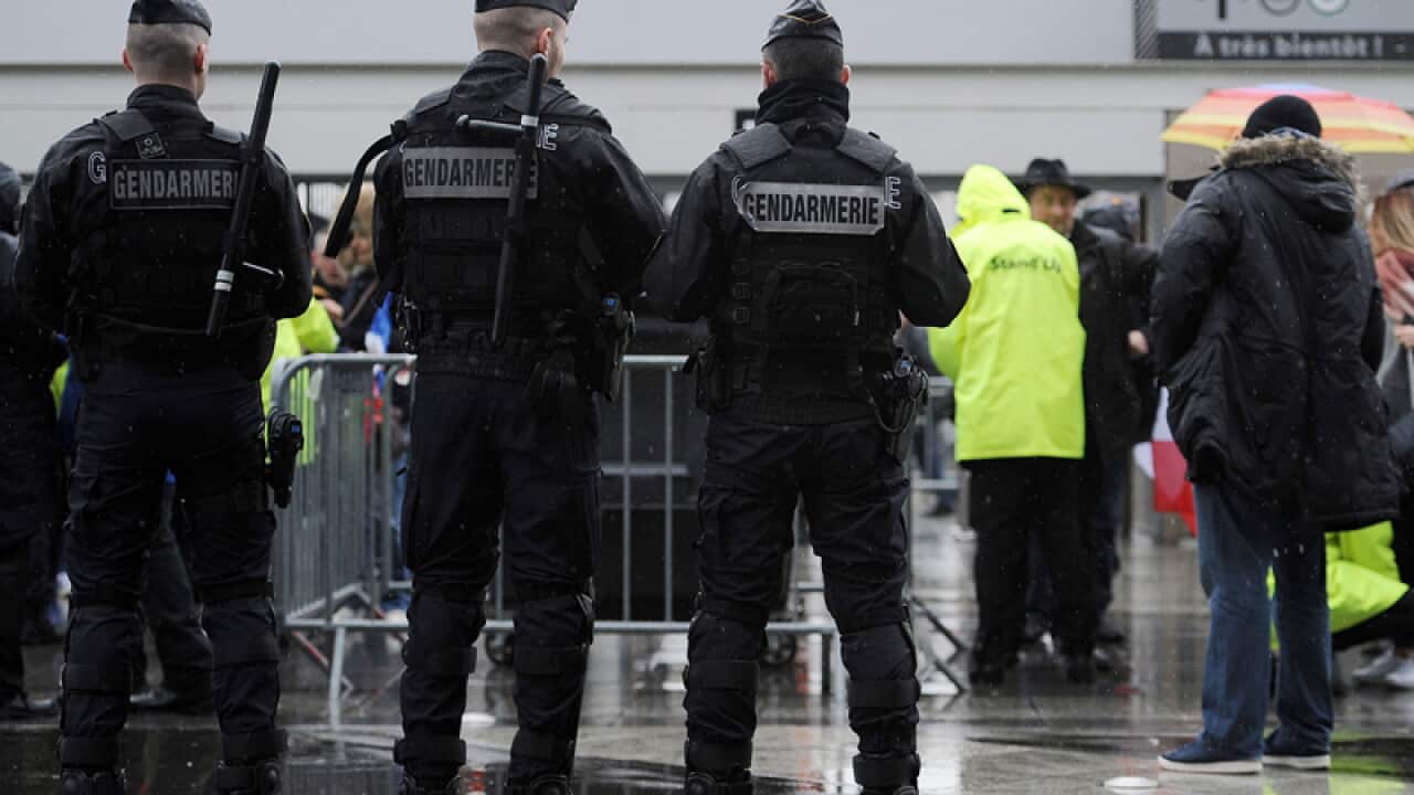 Armed police inside the Stade de France in Paris