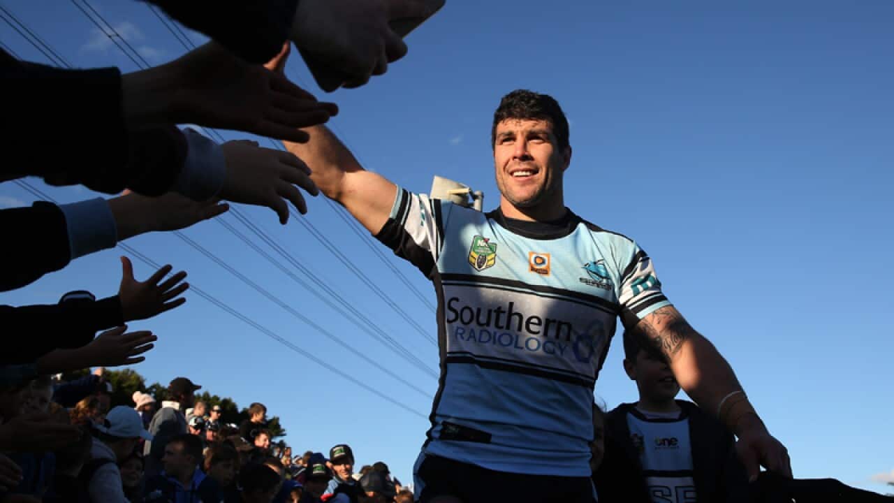Michael Ennis of the Sharks with fans