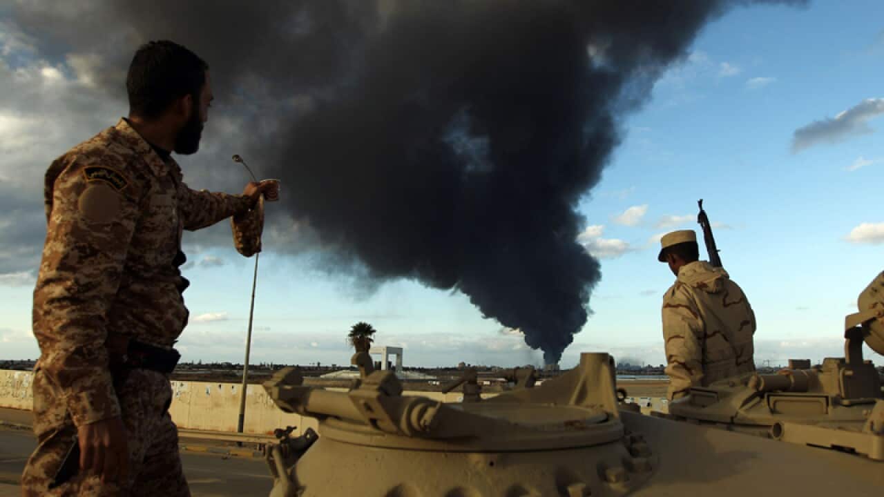 Members of the Libyan army during clashes against Islamist gunmen