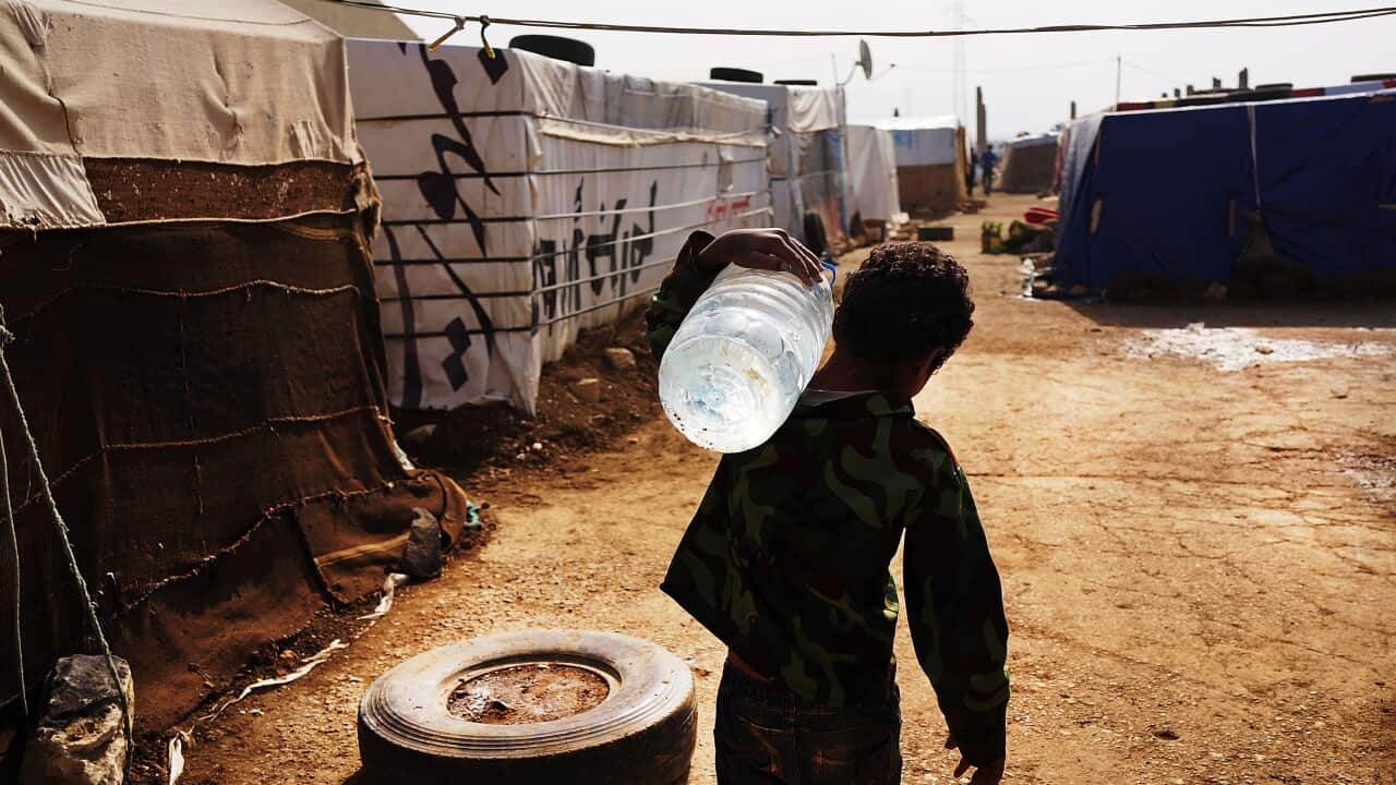 A displaced Syrian child in a makeshift camp for Syrian refugees near the border with Syria in the Bekaa Valley, Lebanon Getty.jpg