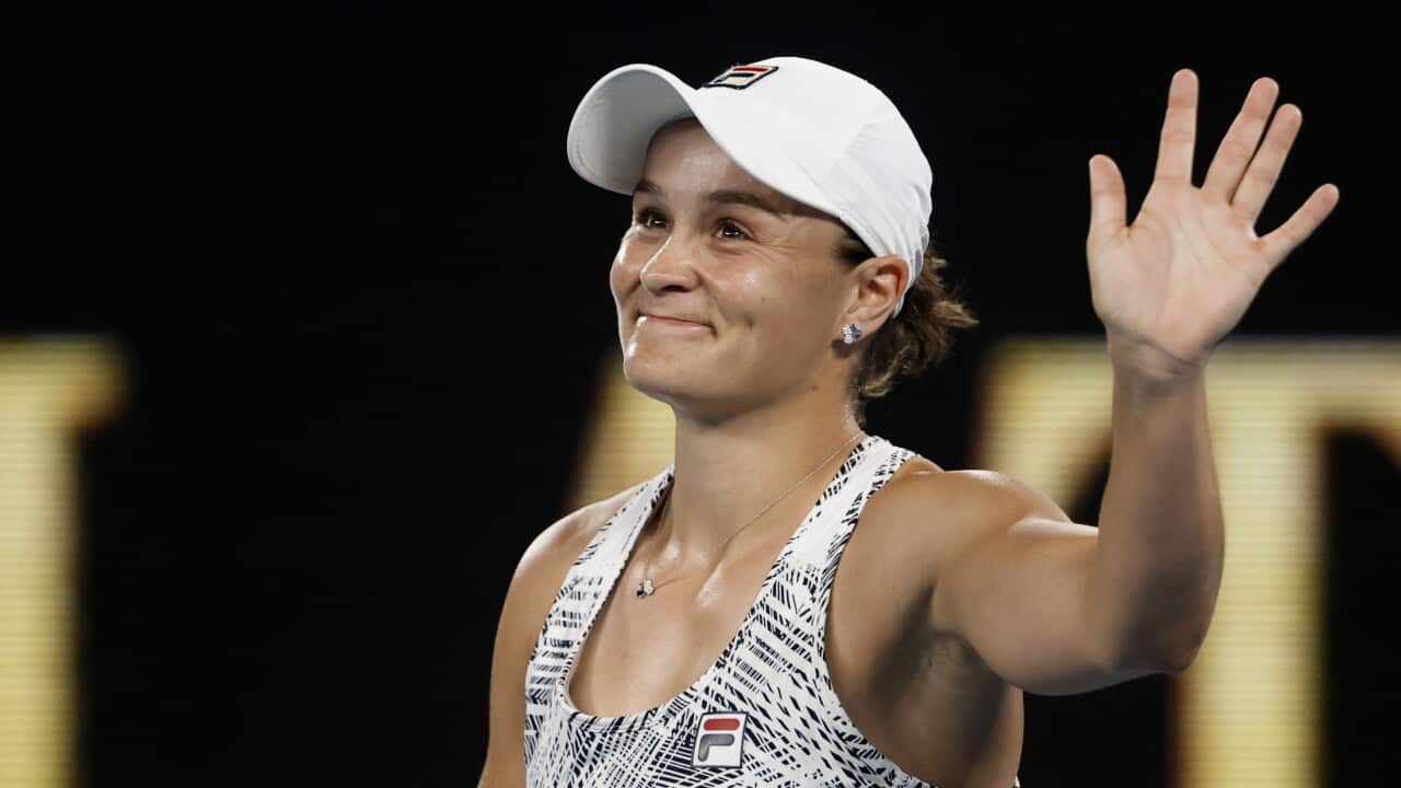 Ash Barty of Australia waves after defeating Madison Keys of the U.S. in their semifinal match at the Australian Open tennis championships in Melbourne, Australia, Thursday, Jan. 27, 2022. (AP Photo/Hamish Blair)