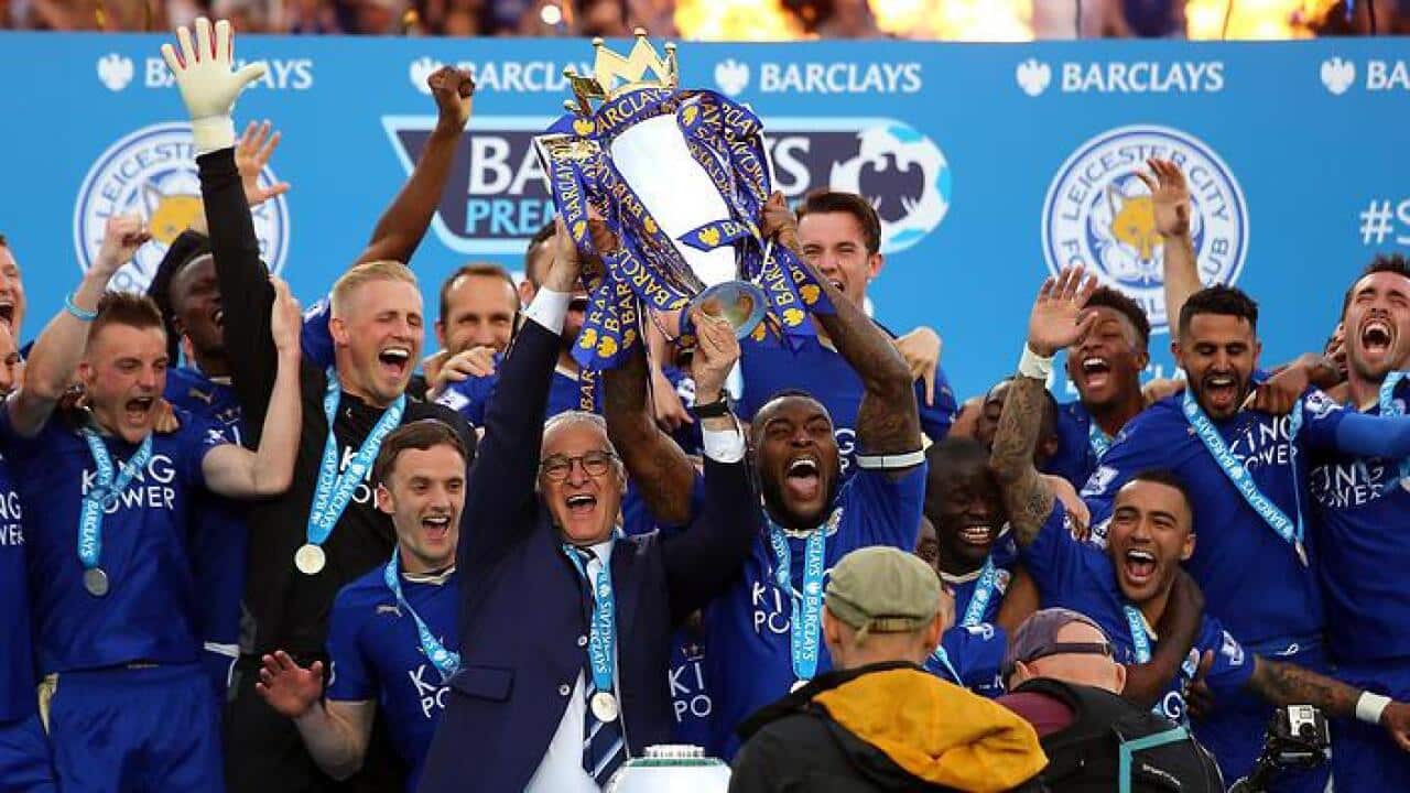 Leicester City hold up the EPL trophy
