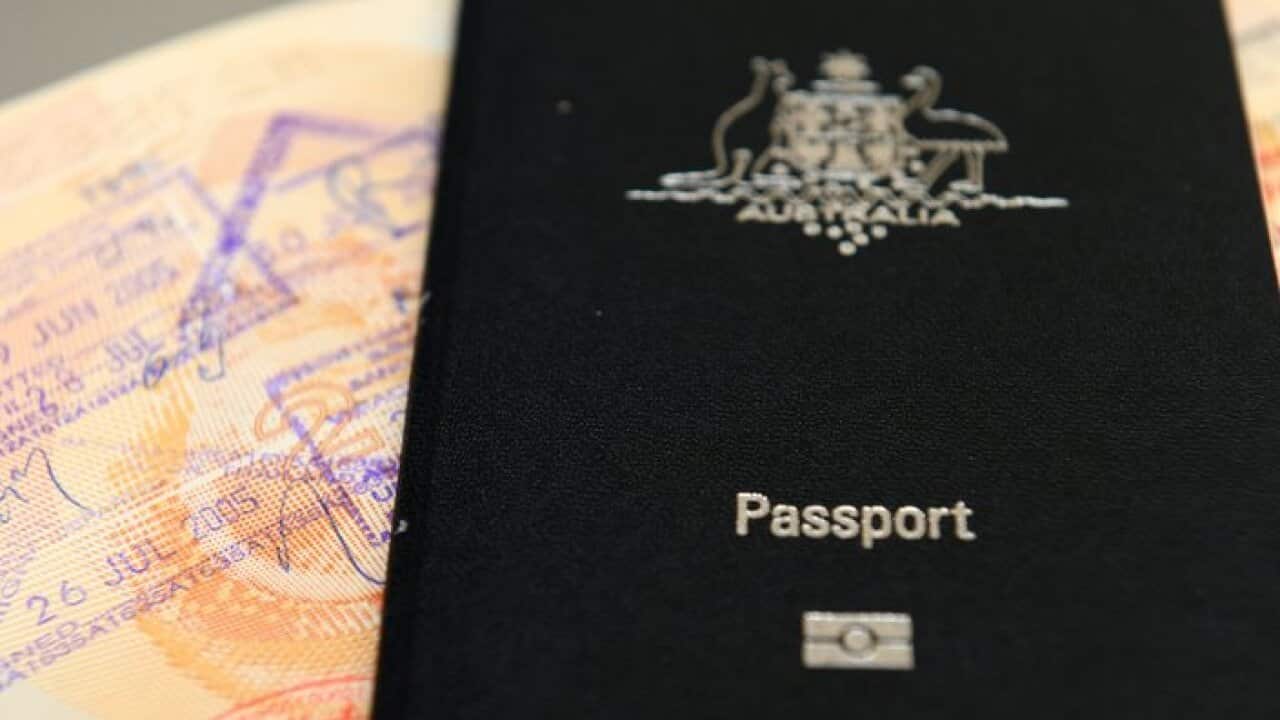 An Australian passport pictured in Brisbane, Thursday, July 25, 2013. (AAP Image/Dan Peled) NO ARCHIVING