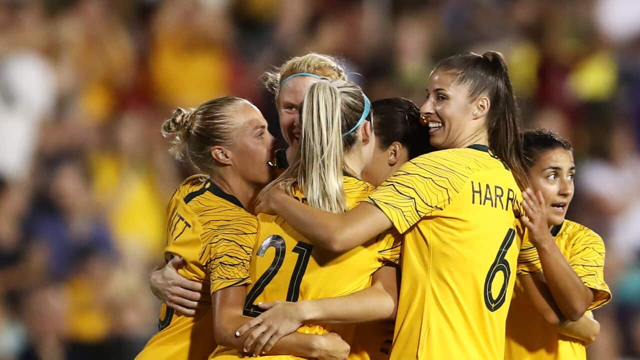 Hayley Raso celebrates with team mates after scoring a goal during the Cup of Nations football match between Australia and New Zealand, February 2019.