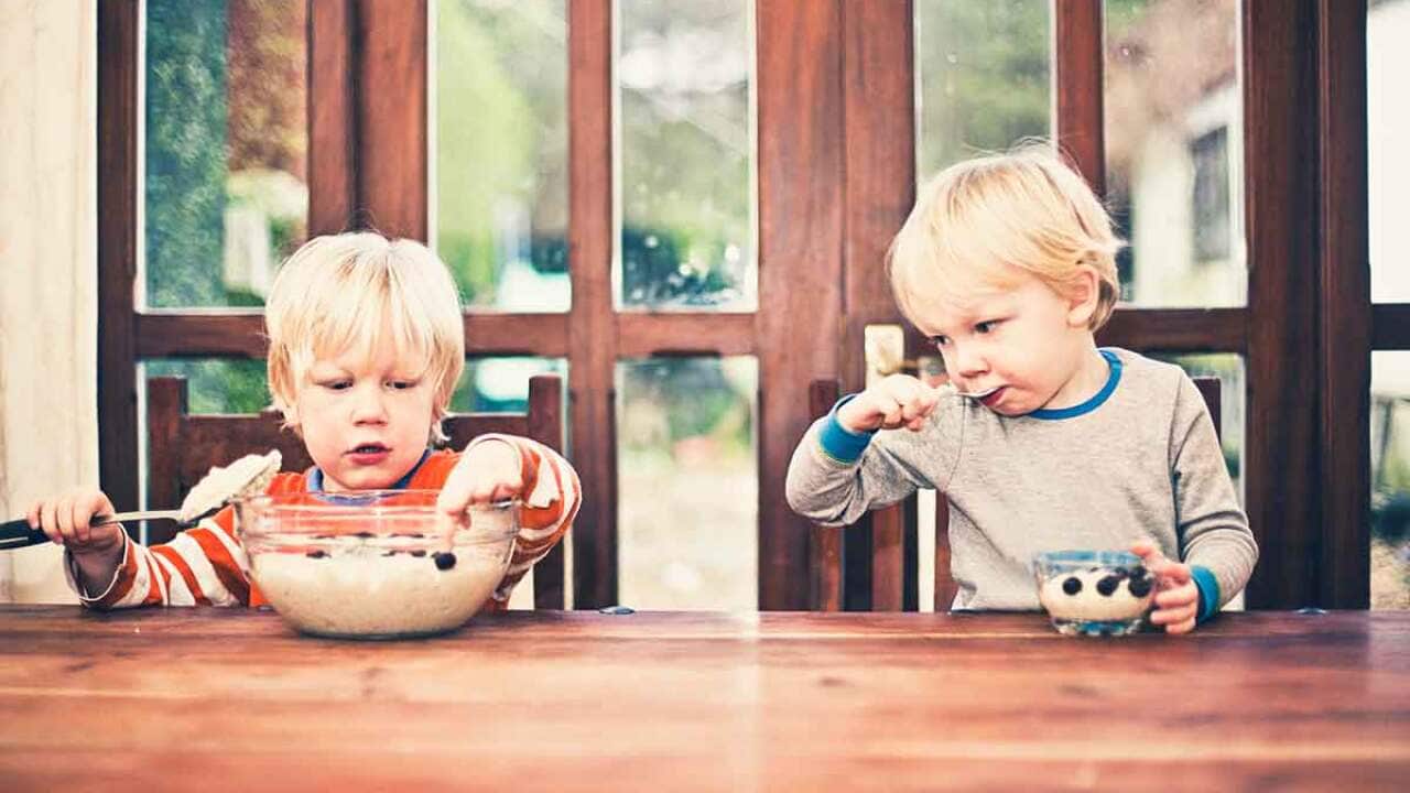 Children with porridge