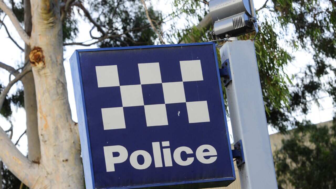 A police station sign