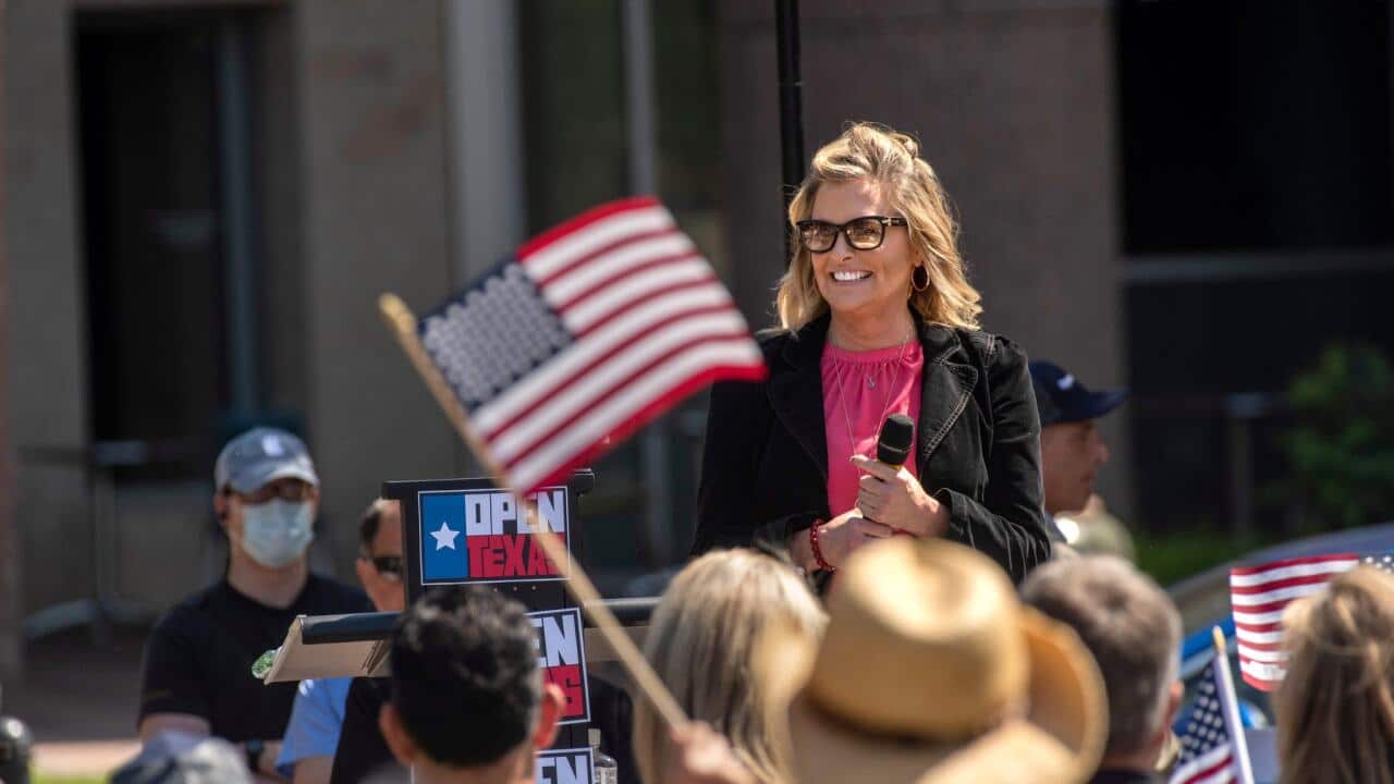 Shelley Luther, a Dallas hair salon owner who defied an order to keep her business closed, at a rally protesting such restrictions in Frisco, Texas, last month.Credit...