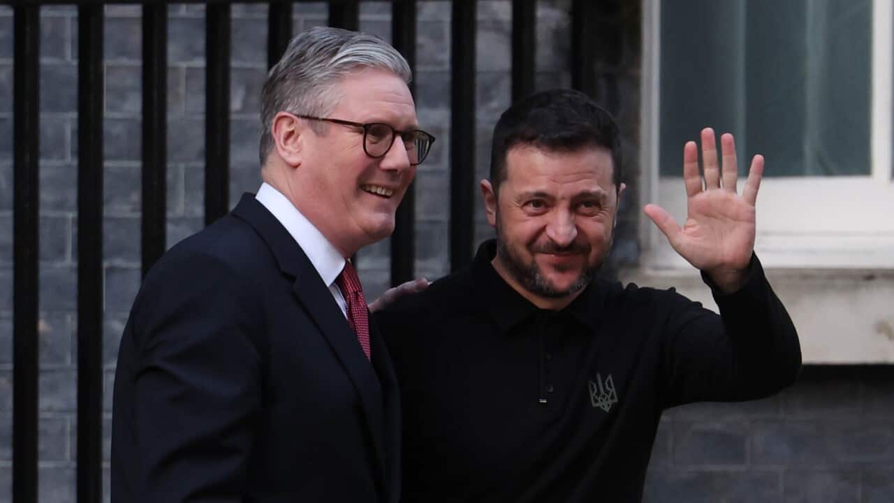 UK Prime Minister Keir Starmer poses for photos with Ukraine's President Volodymyr Zelenskyy