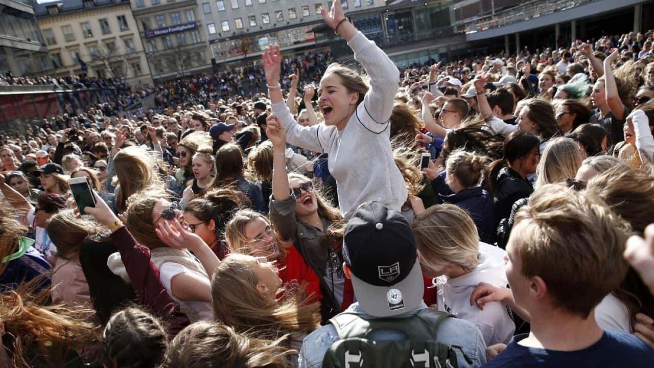 Hundreds of fans of Avicii honoured the artist at Sergels torg in central Stockholm, Sweden