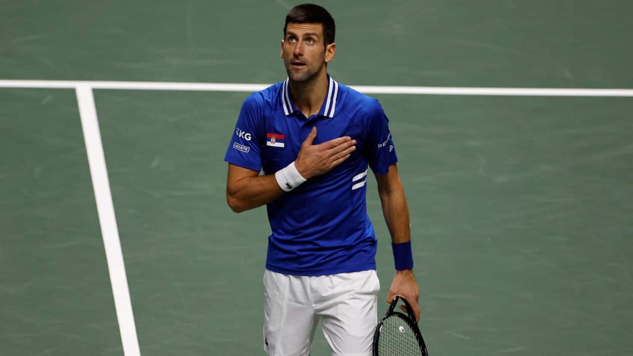 Novak Djokovic of Serbia celebrates a winning point against Marin Cilic of Croatia.
