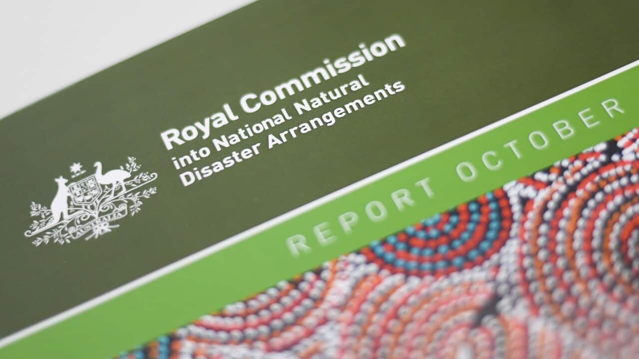 The cover of the 2020 Report of the ‘Royal Commission into National Natural Disaster Agreements’ is seen at Parliament House in Canberra, Friday, October 30, 2020. (AAP Image/Lukas Coch) NO ARCHIVING