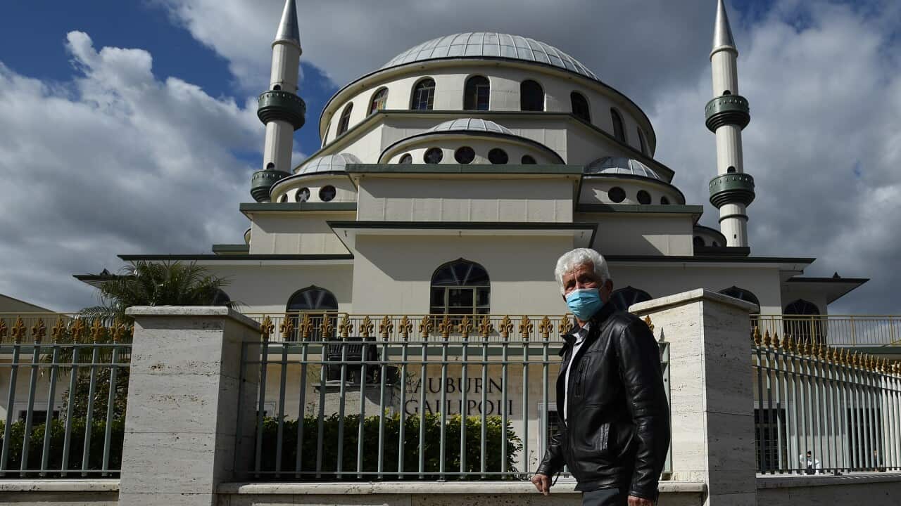 A member of the Muslim community outside the Auburn Gallipoli Mosque in Auburn, Sydney.