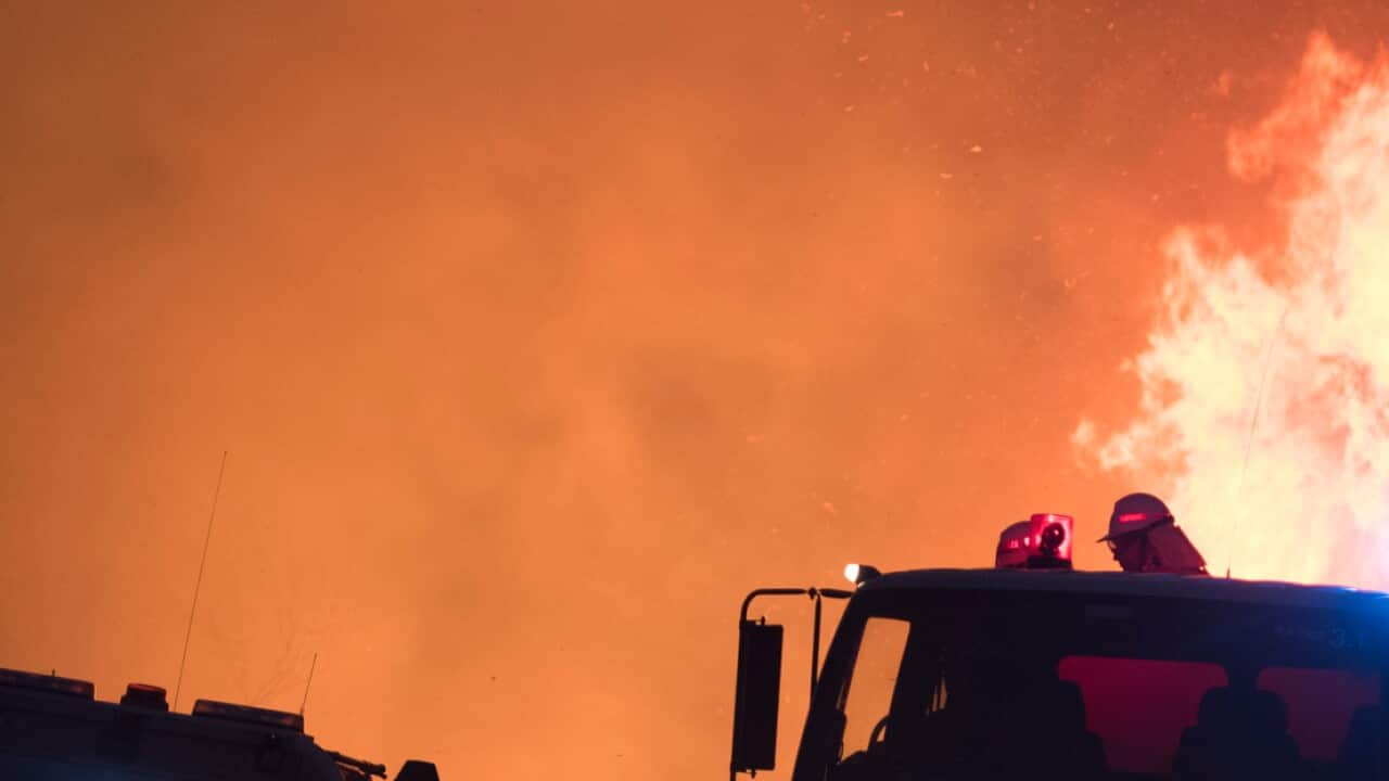 Firefighters working to contain a fire in Southern Tasmania in December