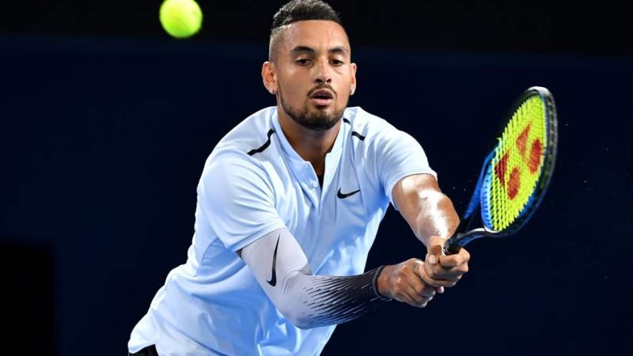 Nick Kyrgios of Australia in action against Ryan Harrison.