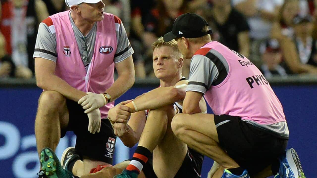 Nick Riewoldt after being injured