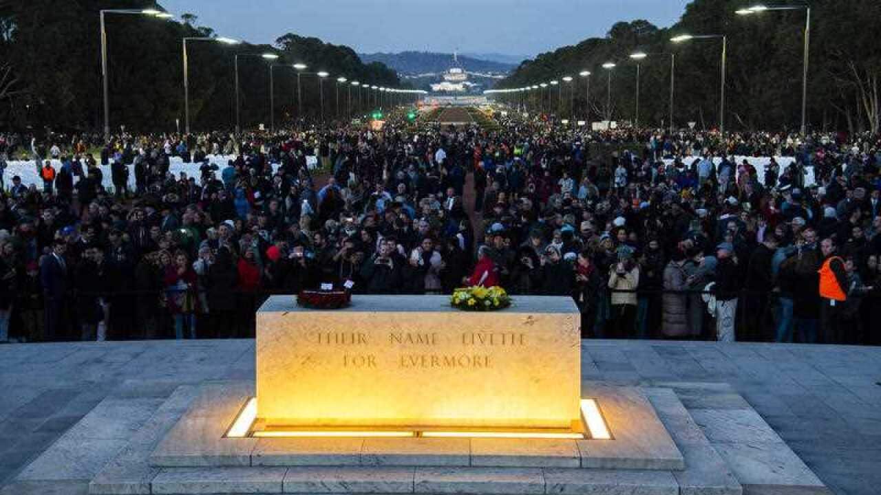 A general view of the crowd during the Anzac Day dawn service at the Australian War Memorial in Canberra, Wednesday, April 25, 2018.
