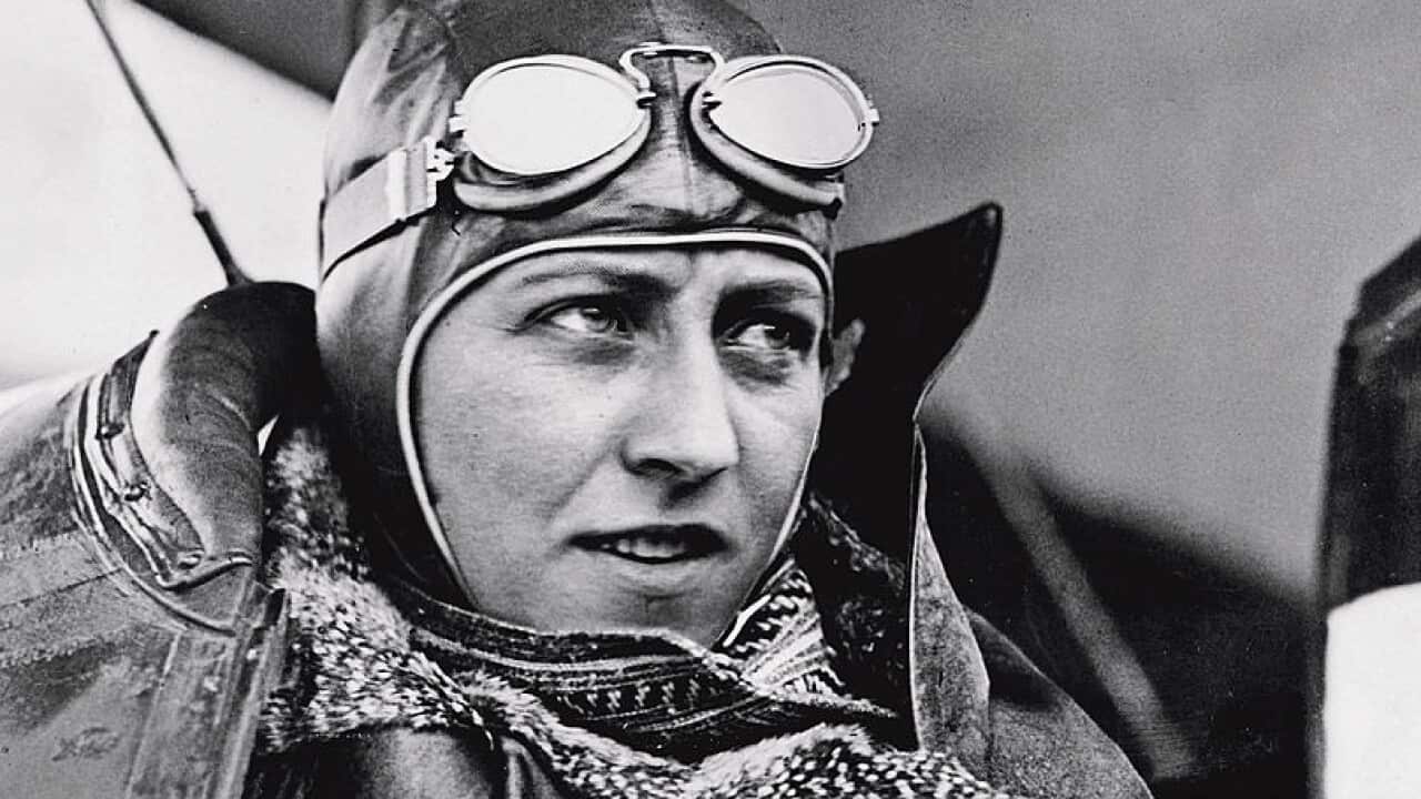 Amy Johnson at her cockpit