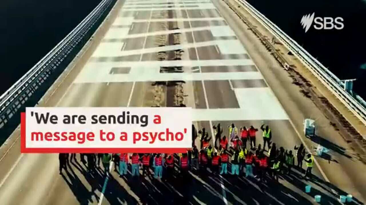 Giant graffiti letters across Europe send message to Putin