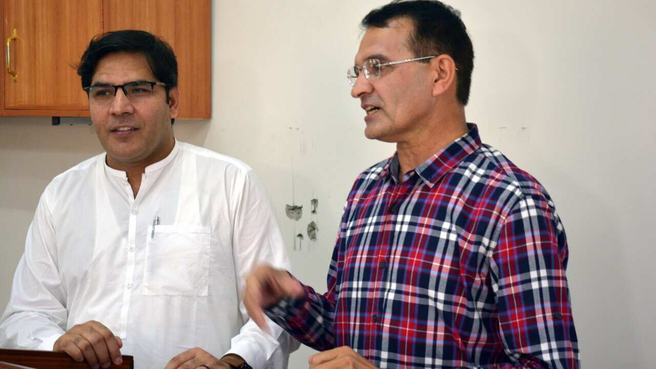 Keran Khan (left) Dr Anwar Orekzai (right)