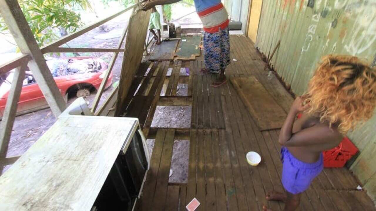 Wooden boards of verandah missing