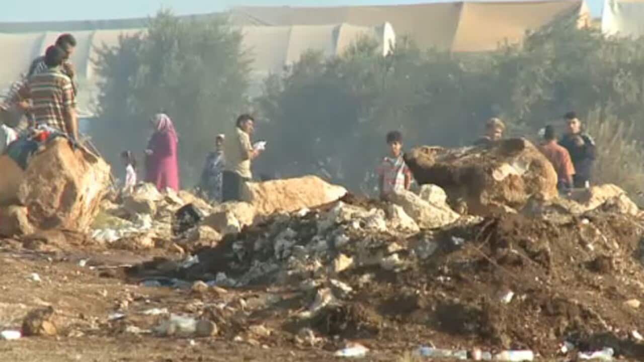 Syrian_refugee_camp_screenshot_L_CNN_1856338674