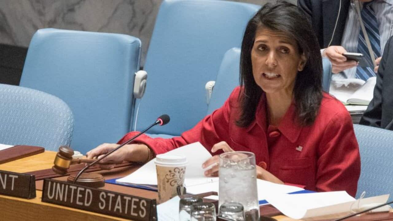 United States' Ambassador United Nations and current Security Council President Nikki Haley opens a Security Council meeting on the situation in Syria, Friday, April 7, 2017 at United Nations headquarters.