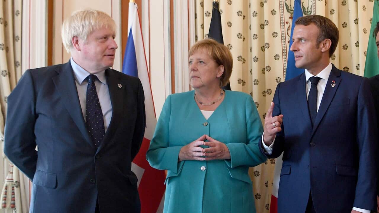 Prime Minister Boris Johnson (left) with German Chancellor Angela Merkel and French President Emmanuel Macron
