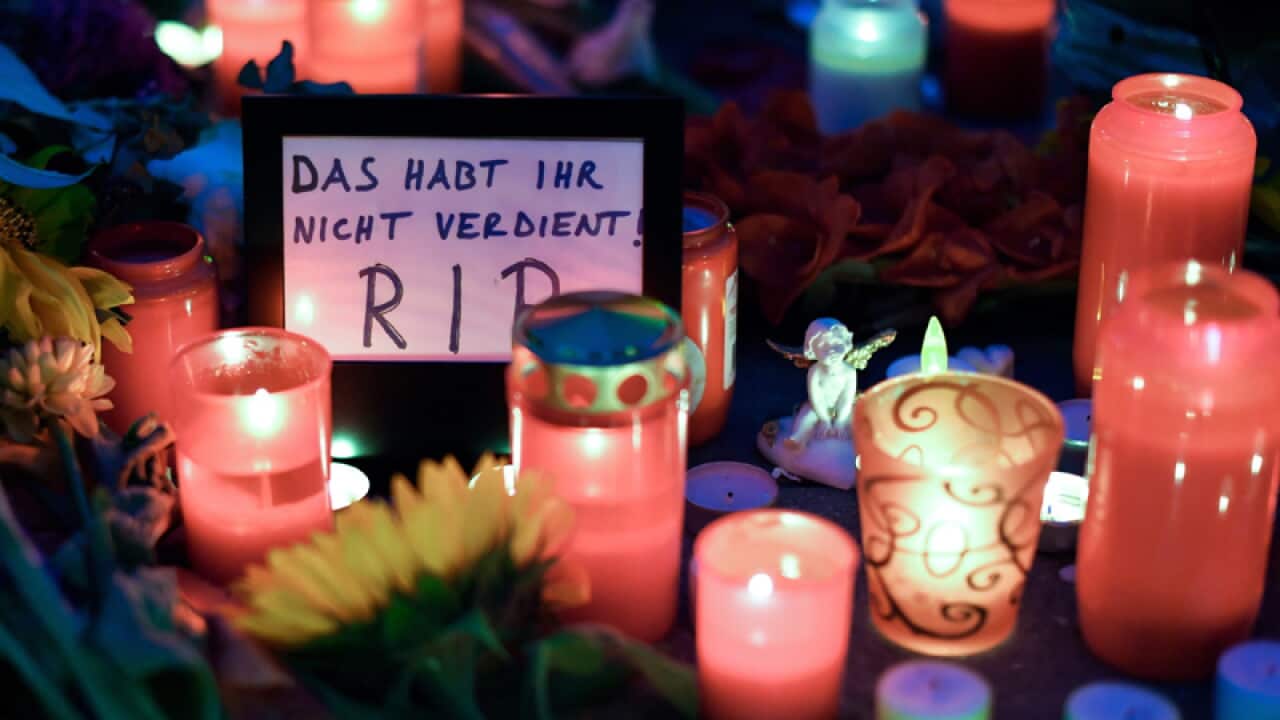tribute outside the Olympia shopping center