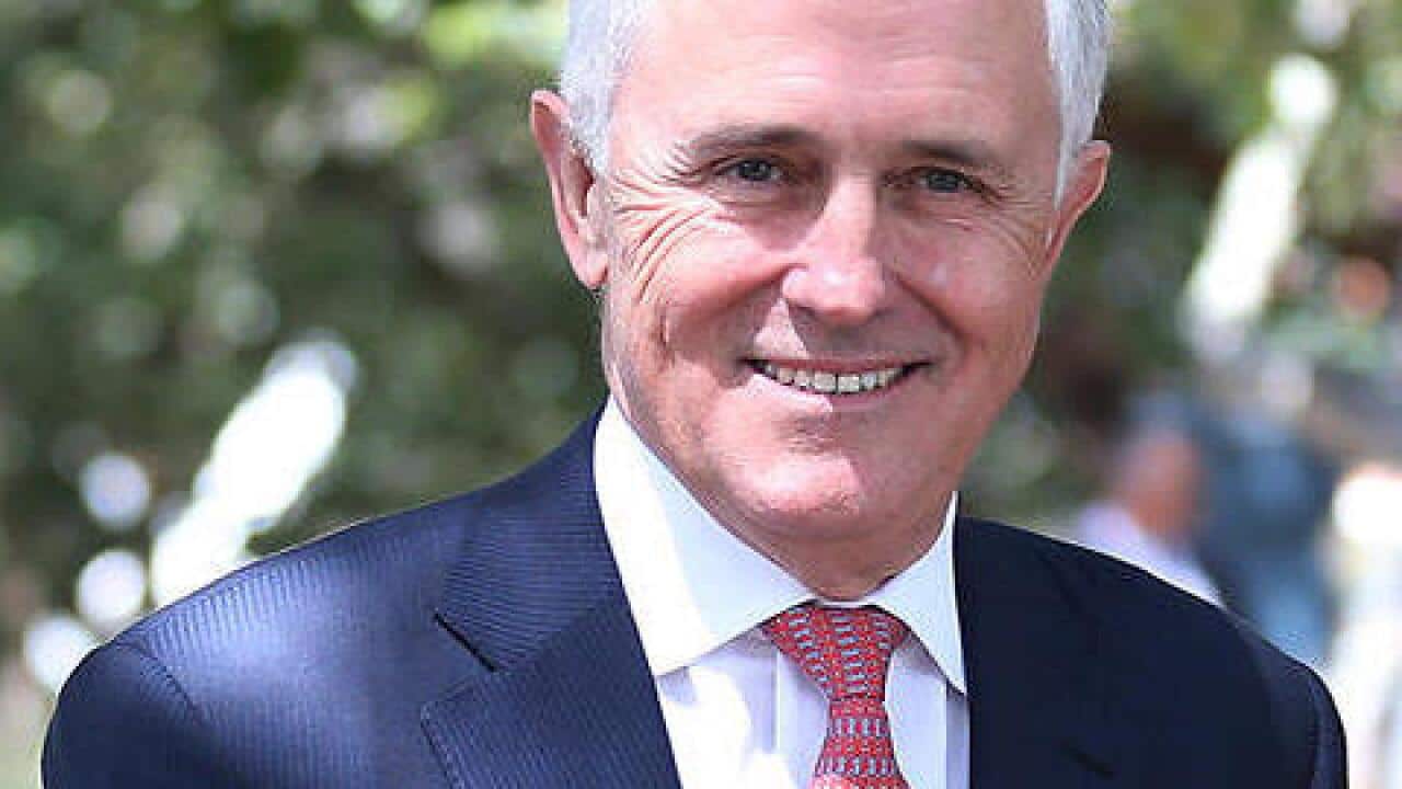 Australian Prime Minister Malcolm Turnbull smiles as he arrives for a visit to Bronte Public School in Sydney, Monday, Nov. 2, 2015. (AAP Image/David Moir) NO ARCHIVING