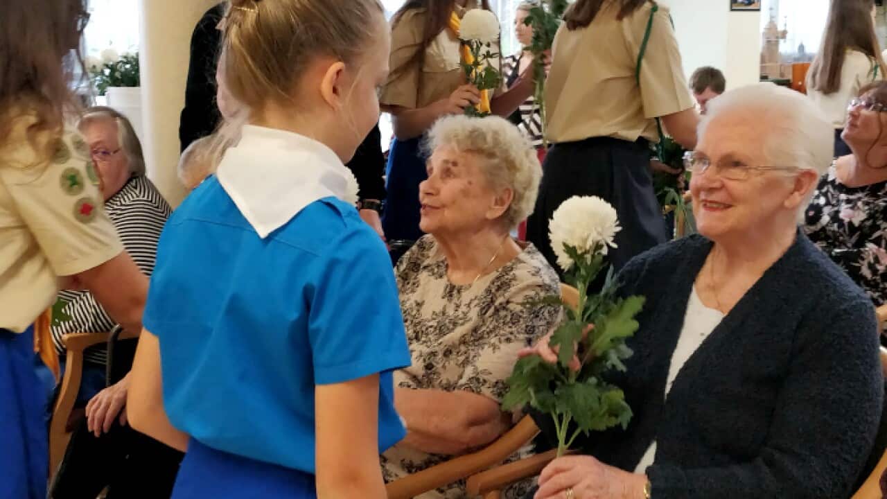 Russian Scouts visiting the residents of Aged Care
