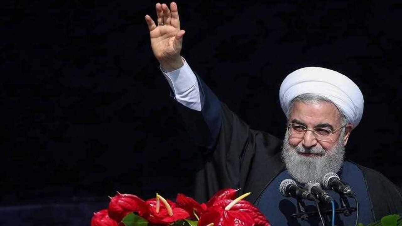 Iranian president Hassan Rouhani greeting the crowd during a ceremony marking the 39th anniversary of the 1979 Islamic revolution at the Azadi (Freedom) Square in Tehran, Iran, 11 February 2018.