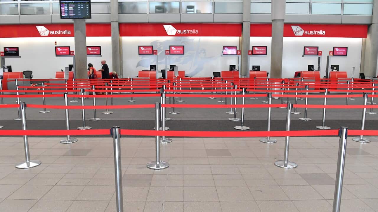 A near-empty check-in counter at Brisbane domestic airport