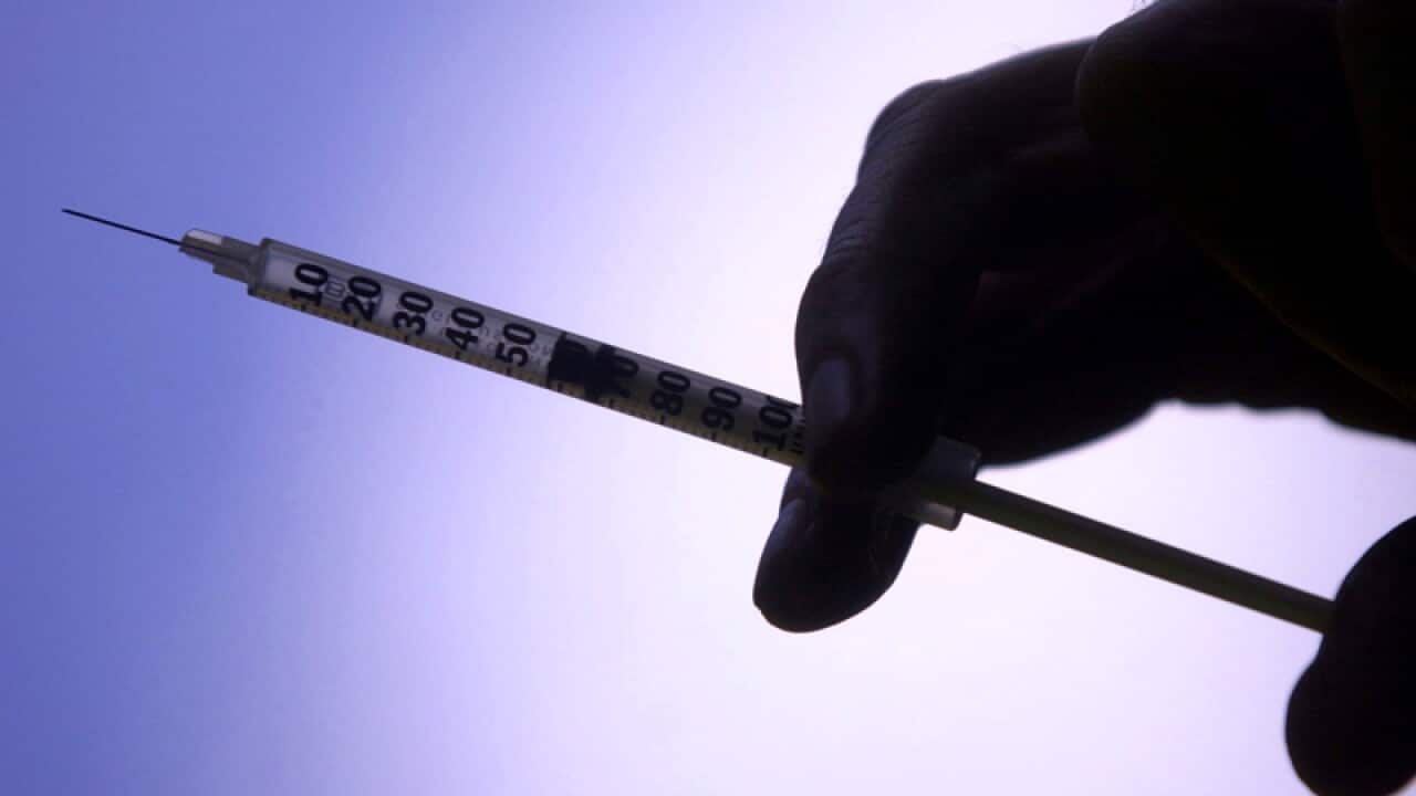 Hep C doctor gets 14 yrs for infecting 55