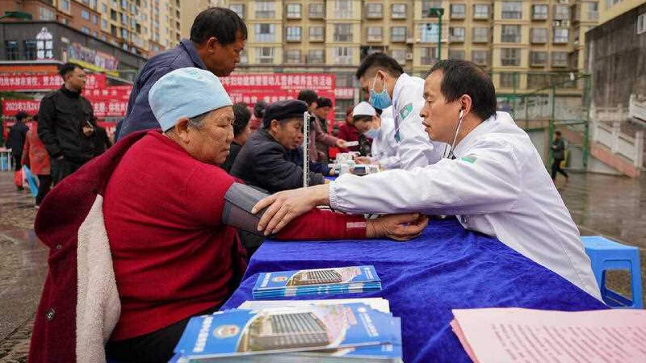 Volunteers perform a free tuberculosis clinic in Qiandongnan Miao and Dong autonomous Prefecture Southwest China's Guizhou province March 23 2023. March 24 marks th (002).jpg