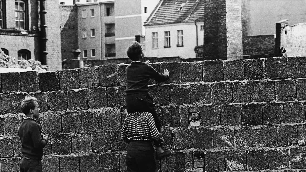 West Berlin Children At The Wall