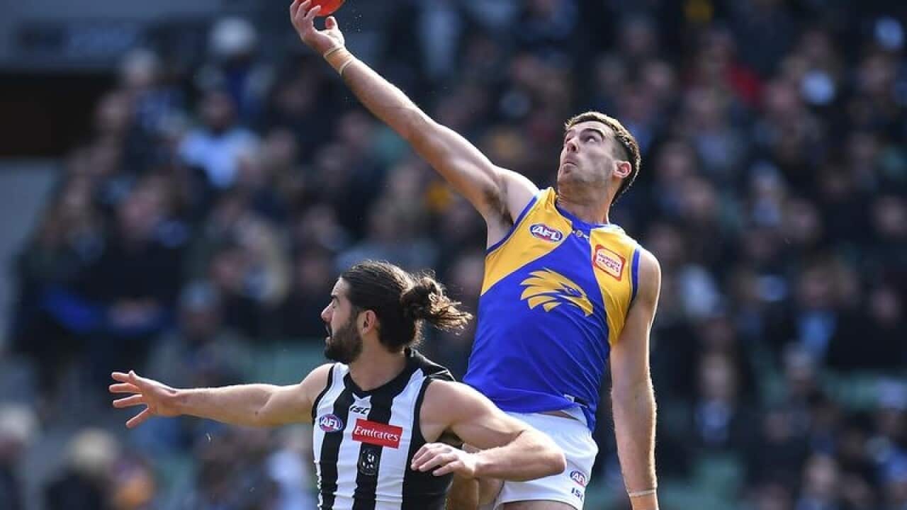 West Coast Eagles ruckman Scott Lycett (R) contests a mark