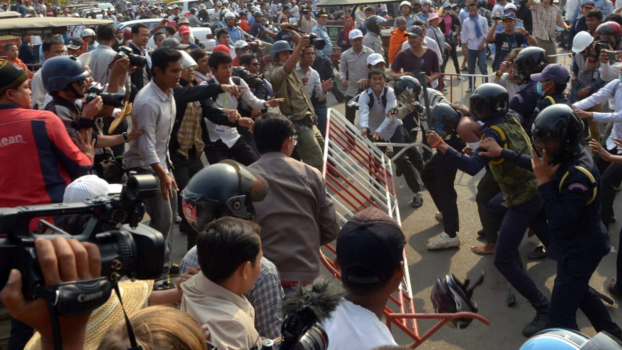 Cambodia police and protestors