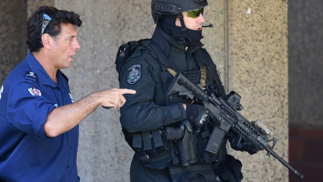 NSW Public Order and Riot Squad Police are seen on Phillip Street